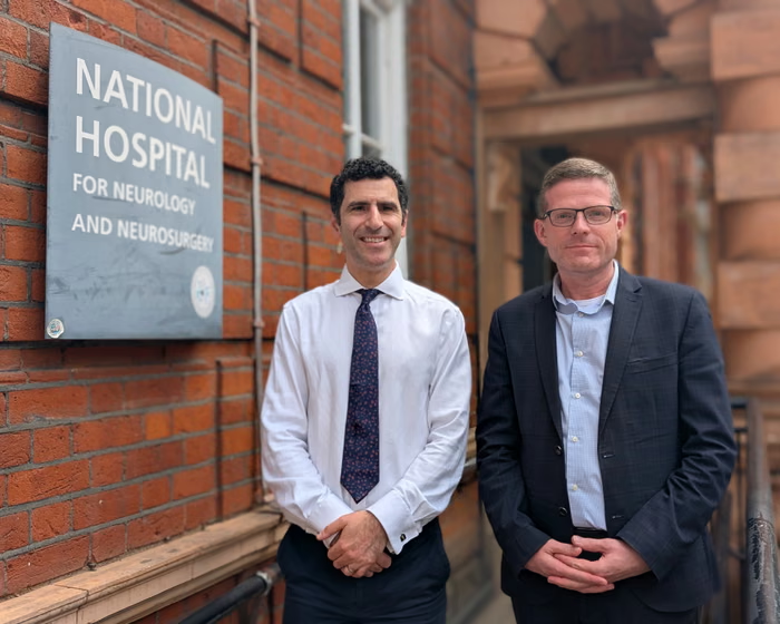 Rhys Hibbert, right (with neurosurgeon Hani Marcus, left) was the first patient to have a brain tumour successfully removed in an AI-assisted operation. He was operated on at the National Hospital for Neurology and Neurosurgery in London. Photograph: UCLH/PA